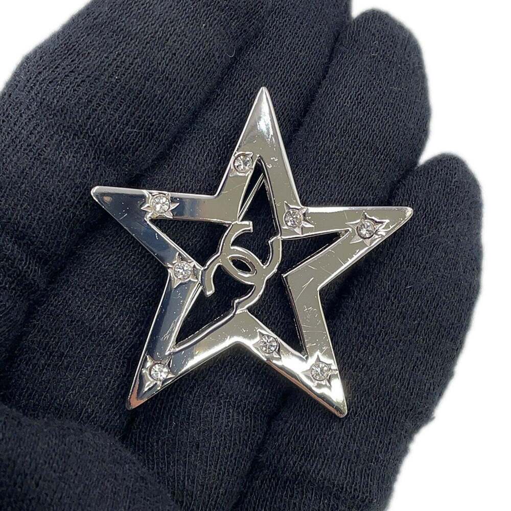 CHANEL Silver Logo Brooch - Picture 5 of 9